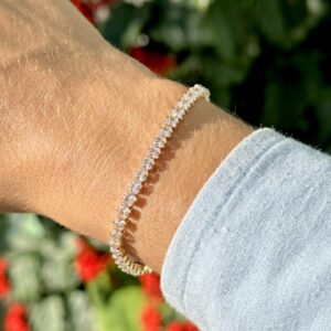 Pulseira riviera quadrada com zircônias brancas em banho ouro 18k.