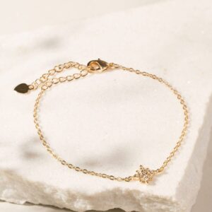 Pulseira com  estrela pequena cravejada com zircônias brancas  em banho ouro 18k . - Imagem 2